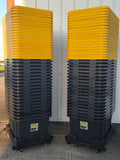 Two stacks of black totes with yellow lids on dollies