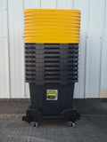 Stack of black totes with yellow lids on dolly